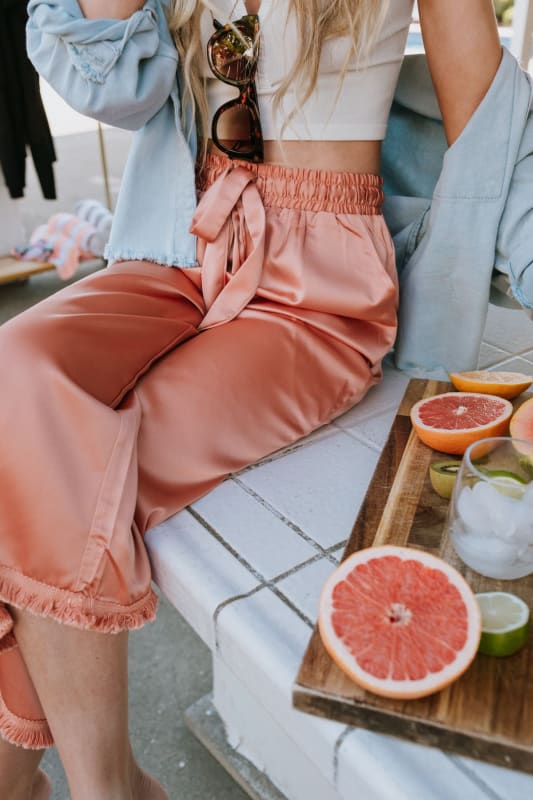 Everyday spring outfit! Click the photo to shop this look! 🎀 | Peach pants  outfit, Pink shirt outfit, Pink pants outfit